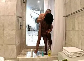sexy black milf showers with white sugar daddy in penthouse