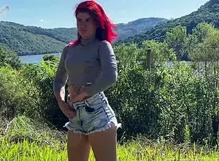 Redhead model flashes pussy in country boots