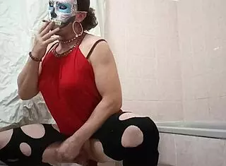 A travesti enjoys using a dildo in this narrative scene with toys.