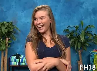 Eighteen girl enjoys nuru massage with oiled body