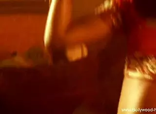 sexy belly dancer with brunette features teasing and dancing in indian asian style with erotic moves.