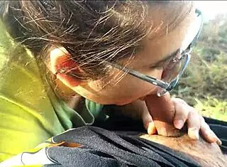 Latina girlfriend gives oral to friend at public lake, leading to orgasm.