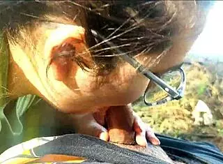 Latina girlfriend gives oral to friend at public lake, leading to orgasm.