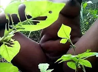 tribal african babe fingering her pussy solo in the woods