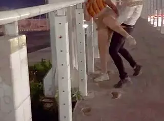 Couple fucking on the bridge in public