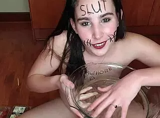 teen slut eating piss-soaked fruits with body writing
