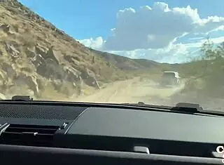 Latina Cami Strell fucked doggystyle in outdoor car, squirting with big natural tits.