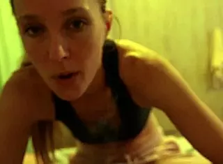 Couple shares intimate bed moment with brunette