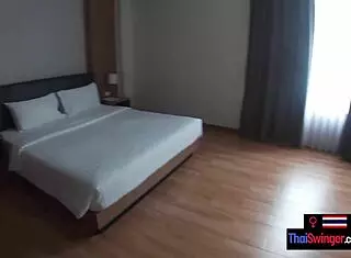 Thai teen girlfriend sucks big white cock in hotel room