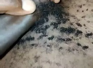 Gay twink wanks his big hairy cock at home