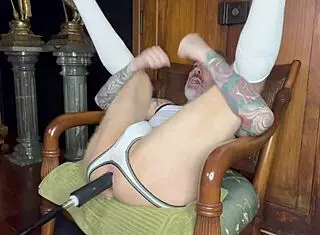 Fuck Machine Dominates in Red for Solo Mature Play