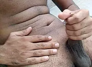 Hot Indian gay teen jerks off big cock in public.