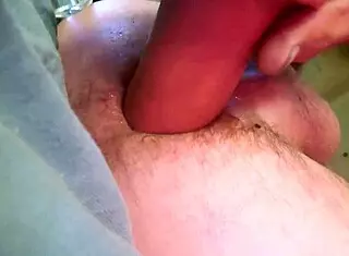 just a dude messin with a dildo in his ass.