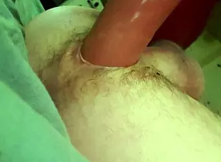just a dude messin with a dildo in his ass.