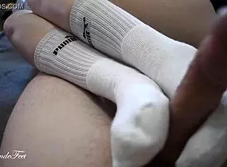 miley grey gives sexy footjob in long socks to big cock