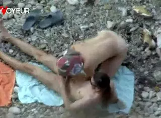 Holy! Beach Voyeur Catches Booty Babe Swallowing Full Mouth of Cum!