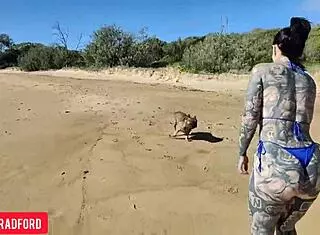 Bikini Beauty Struts on Public Beach