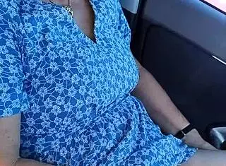 In the public carpark, a housewife gets caught wanking