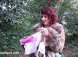 Natural Rose flashes natural tits outdoors in stockings.