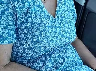 In the public carpark, a housewife gets caught wanking