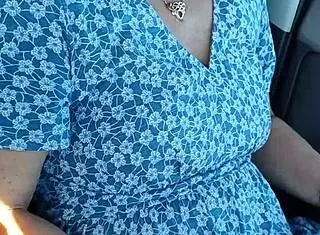 In the public carpark, a housewife gets caught wanking