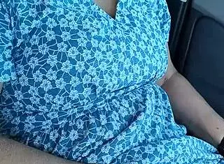 In the public carpark, a housewife gets caught wanking