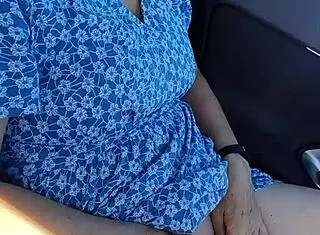 In the public carpark, a housewife gets caught wanking