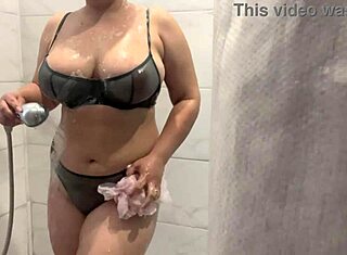 Caught stepmother showering on hidden cam with monster cock nearby. Her wet body is pure temptation.