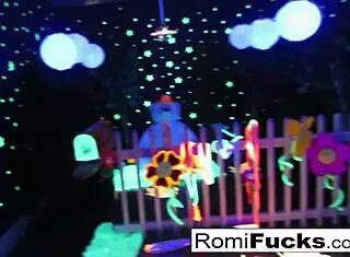 Romi Rain and Dani have bold lesbian fun under black lights