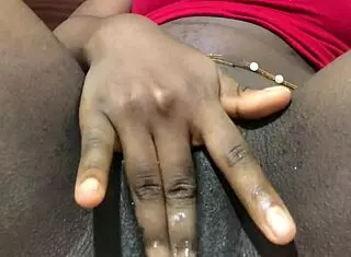 This ebony girl at home, she's got a big wet pussy and she's masturbating all alone until she orgasms.