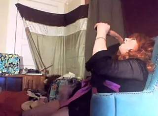 Redhead Tranny Swallows Vibrating Dildo!