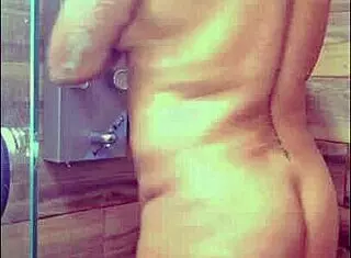 She gets hot and showers to orgasm