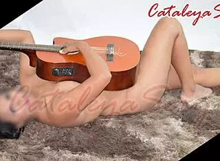 model says pose in outfits and naked with guitar, so sensual