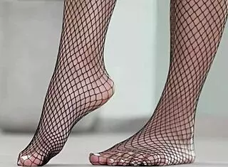 Petite brunette crushes fruits with bare feet and heels in 4k