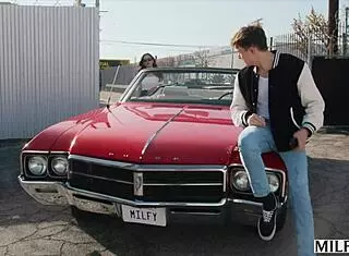 Fit milf Justine rides and fucks young stud hard in classic car