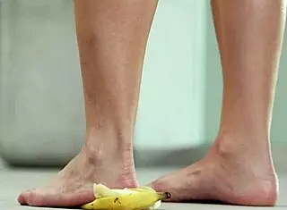 Petite brunette crushes fruits with bare feet and heels in 4k