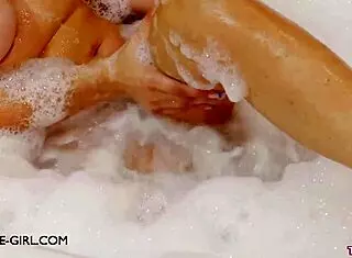 Delightful Young 18+ Brunette Model Poses in Bath Photoshoot