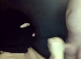 my step sister's hot mouth sucks cock under a hidden balaclava.